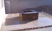 black-granite-firepit-in-landscape black-granite-firepit-in-landscape